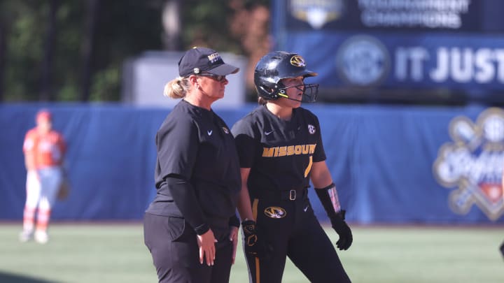 May 9, 2024; Auburn, AL, USA; Missouri Tigers head coach Larissa Anderson talks with infielder Maddie Gallagher (1) during the game against the Florida Gators in the SEC Softball Championship game at Jane B. Moore Field. Mandatory Credit: John Reed-USA TODAY Sports May 9, 2024; Auburn, AL, USA; Missouri Tigers head coach Larissa Anderson talks with infielder Maddie Gallagher (1) during the game against the Florida Gators in the SEC Softball Championship game at Jane B. Moore Field. Mandatory Credit: John Reed-USA TODAY Sports