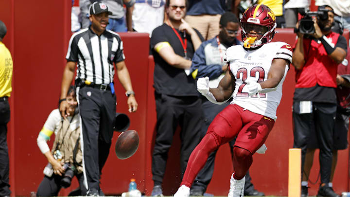 Sep 7, 2025; Landover, Maryland, USA; Washington Commanders running back Jacory Croskey-Merritt (22) reacts after a play during the second quarter against the New York Giants at Northwest Stadium.