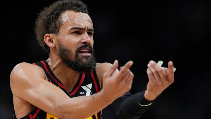 Trae Young reacting against the Milwaukee Bucks