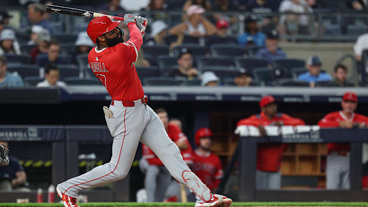 Jun 18, 2025; Bronx, New York, USA; Los Angeles Angels center fielder Jo Adell (7) hits a solo home run during the sixth inning against the New York Yankees at Yankee Stadium. Mandatory Credit: Vincent Carchietta-Imagn Images
