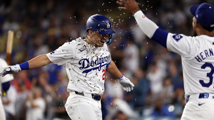Sep 10, 2024; Los Angeles, California, USA; Los Angeles Dodgers center fielder Tommy Edman (25) celebrates his solo home run with out fielder Teoscar Hernandez (37) during the second inning against the Chicago Cubs at Dodger Stadium. Mandatory Credit: Kiyoshi Mio-Imagn Images Sep 10, 2024; Los Angeles, California, USA; Los Angeles Dodgers center fielder Tommy Edman (25) celebrates his solo home run with out fielder Teoscar Hernandez (37) during the second inning against the Chicago Cubs at Dodger Stadium. Mandatory Credit: Kiyoshi Mio-Imagn Images