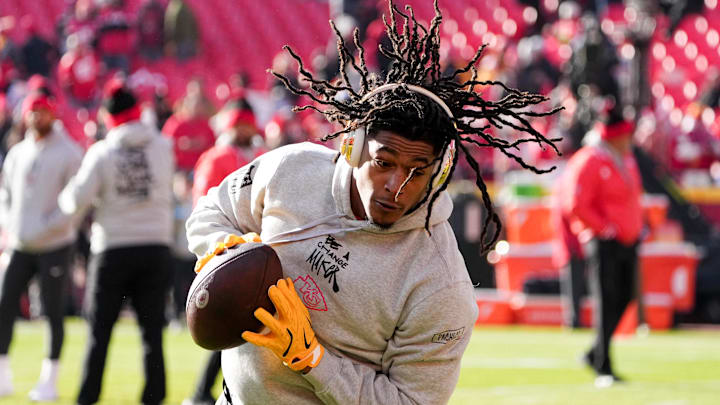 Dec 21, 2024; Kansas City, Missouri, USA; Kansas City Chiefs running back Isiah Pacheco (10) warms up against the Houston Texans prior to a game at GEHA Field at Arrowhead Stadium. Mandatory Credit: Denny Medley-Imagn Images