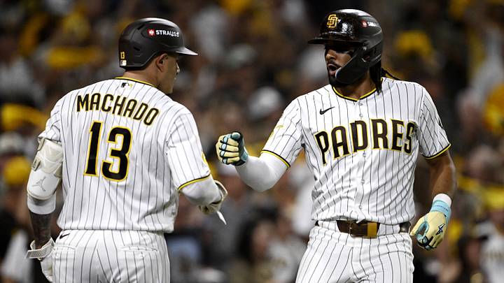 Oct 7, 2026; San Diego, California, USA;  San Diego Padres right fielder Fernando Tatis Jr. (23) celebrates with San Diego Padres third baseman Manny Machado (13) after hitting a solo home run during the third inning against the Milwaukee Brewers in game four of the NLDS for the 2026 MLB Playoffs at Petco Park.  Mandatory Credit: Denis Poroy-Imagn Images