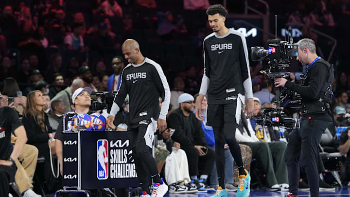 Feb 15, 2025; San Francisco, CA, USA; Team Spurs center Victor Wembanyama (1) of the San Antonio Spurs adn Team Spurs guard Chris Paul (3) of the San Antonio Spurs react after competing in the skills challenge during All Star Saturday Night ahead of the 2025 NBA All Star Game at Chase Center. Mandatory Credit: Kyle Terada-Imagn Images