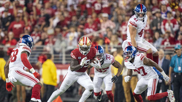 September 21, 2023; Santa Clara, California, USA; San Francisco 49ers wide receiver Deebo Samuel (19) runs the football against New York Giants linebacker Bobby Okereke (58), cornerback Tre Hawkins III (37), linebacker Micah McFadden (41), and safety Jason Pinnock (27) during the third quarter at Levi's Stadium. September 21, 2023; Santa Clara, California, USA; San Francisco 49ers wide receiver Deebo Samuel (19) runs the football against New York Giants linebacker Bobby Okereke (58), cornerback Tre Hawkins III (37), linebacker Micah McFadden (41), and safety Jason Pinnock (27) during the third quarter at Levi's Stadium.