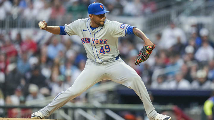 Apr 8, 2024; Cumberland, Georgia, USA; New York Mets starting pitcher Julio Teheran (49) pitches against the Atlanta Braves during the first inning at Truist Park. Mandatory Credit: Dale Zanine-Imagn Images Apr 8, 2024; Cumberland, Georgia, USA; New York Mets starting pitcher Julio Teheran (49) pitches against the Atlanta Braves during the first inning at Truist Park. Mandatory Credit: Dale Zanine-Imagn Images