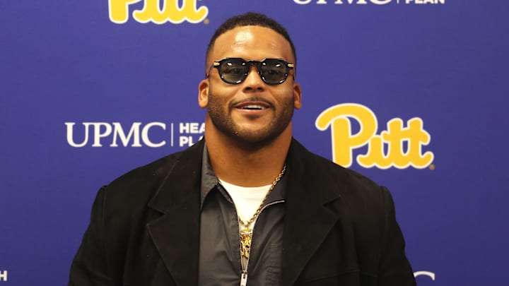 Nov 15, 2025; Pittsburgh, Pennsylvania, USA;  Former Pittsburgh Panthers defensive end Aaron Donald speaks at a news conference before having his number 97 jersey retired by the University at halftime of the game against the Notre Dame Fighting Irish at Acrisure Stadium. Mandatory Credit: Charles LeClaire-Imagn Images