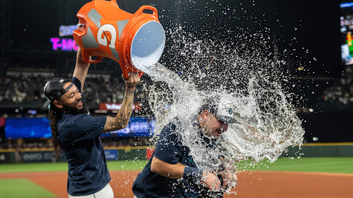 Sep 24, 2025; Seattle, Washington, USA; Seattle Mariners shortstop J.P. Crawford (3), left, douses catcher with water after a game against the Colorado Rockies at T-Mobile Park. Mandatory Credit: Stephen Brashear-Imagn Images Sep 24, 2025; Seattle, Washington, USA; Seattle Mariners shortstop J.P. Crawford (3), left, douses catcher with water after a game against the Colorado Rockies at T-Mobile Park. Mandatory Credit: Stephen Brashear-Imagn Images