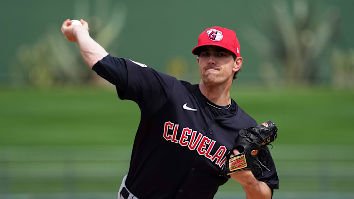 Mar 12, 2024; Surprise, Arizona, USA; Cleveland Guardians starting pitcher Shane Bieber (57) pitches against the Texas Rangers during the first inning at Surprise Stadium. Mandatory Credit: Joe Camporeale-Imagn Images