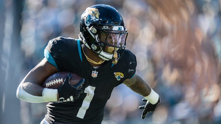 Nov 19, 2023; Jacksonville, Florida, USA; Jacksonville Jaguars running back Travis Etienne Jr. (1) Nov 19, 2023; Jacksonville, Florida, USA; Jacksonville Jaguars running back Travis Etienne Jr. (1)