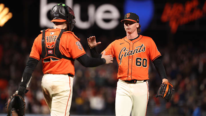 May 2, 2025; San Francisco, California, USA; San Francisco Giants catcher Sam Huff (23) celebrates with starting pitcher Hayden Birdsong (60) after the game against the Colorado Rockies at Oracle Park May 2, 2025; San Francisco, California, USA; San Francisco Giants catcher Sam Huff (23) celebrates with starting pitcher Hayden Birdsong (60) after the game against the Colorado Rockies at Oracle Park