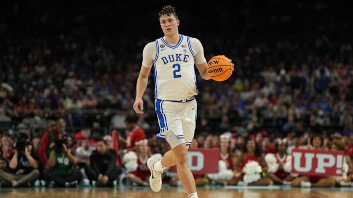 Apr 5, 2025; San Antonio, TX, USA; Duke Blue Devils forward Cooper Flagg (2) dribbles the ball against the Houston Cougars during the second half in the semifinals of the men's Final Four of the 2025 NCAA Tournament at the Alamodome. Mandatory Credit: Bob Donnan-Imagn Images