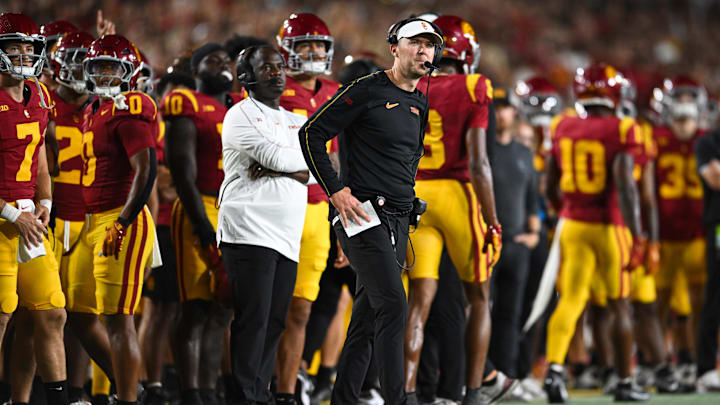 Sep 7, 2024; Los Angeles, California, USA; USC Trojans head coach Lincoln Riley reacts against the Utah State Aggies during the first quarter at United Airlines Field at Los Angeles Memorial Coliseum. Mandatory Credit: Jonathan Hui-Imagn Images