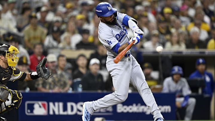 Los Angeles Dodgers outfielder Teoscar Hernandez hits a grand slam during Game 3 of a National League Divisional Series against the San Diego Padres on Tuesday at Petco Park.