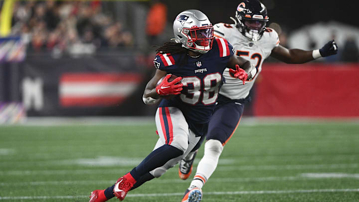 New England Patriots running back Rhamondre Stevenson finds an opening in the last meeting between the teams in 2022. New England Patriots running back Rhamondre Stevenson finds an opening in the last meeting between the teams in 2022.