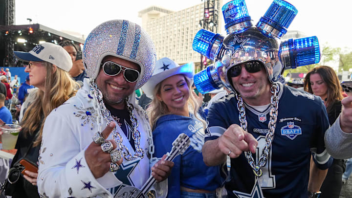 Dallas Cowboys fans pose for a photo before the first round of the NFL Draft at Union Station. Dallas Cowboys fans pose for a photo before the first round of the NFL Draft at Union Station.