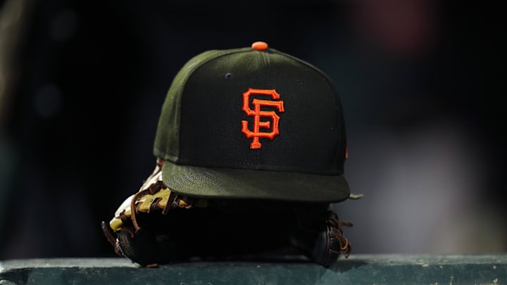 Sep 15, 2023; Denver, Colorado, USA; General view of a San Francisco Giants cap and glove during the ninth inning against the Colorado Rockies at Coors Field. Mandatory Credit: Ron Chenoy-Imagn Images Sep 15, 2023; Denver, Colorado, USA; General view of a San Francisco Giants cap and glove during the ninth inning against the Colorado Rockies at Coors Field. Mandatory Credit: Ron Chenoy-Imagn Images
