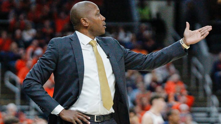 Dennis Gates gestures during the Braggin Rights game