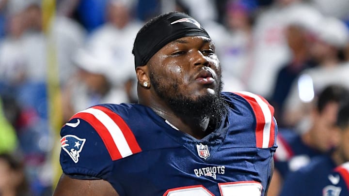 Oct 5, 2025; Orchard Park, New York, USA; New England Patriots defensive end Milton Williams (97) leaves the field after warming up before a game against the Buffalo Bills at Highmark Stadium. Mandatory Credit: Mark Konezny-Imagn Images