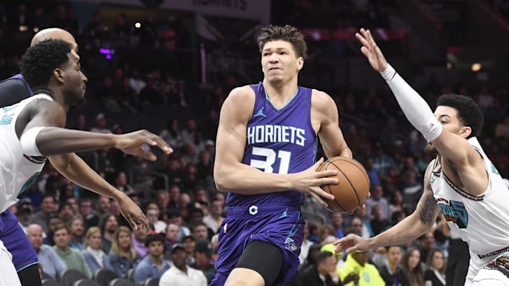 Apr 8, 2025; Charlotte, North Carolina, USA;  Charlotte Hornets forward Tidjane Salaun (31) drives in during the first half against the Memphis Grizzlies at the Spectrum Center. Mandatory Credit: Sam Sharpe-Imagn Images