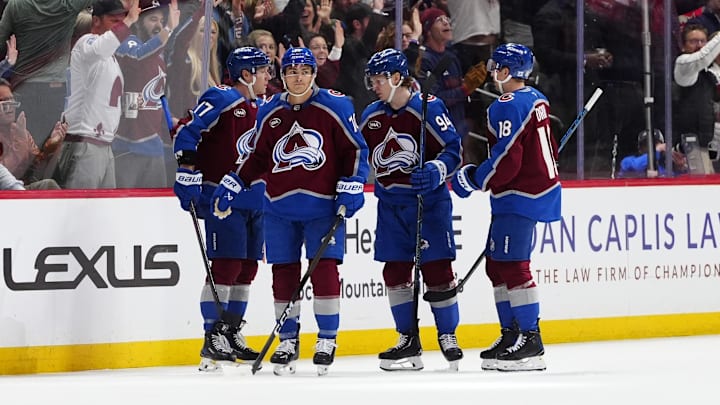 Mar 30, 2026; Denver, Colorado, USA; Colorado Avalanche center Parker Kelly (17) celebrates his goal with defenseman Sam Malinski (70), left wing Joel Kiviranta (94), center Jack Drury (18) in the third period against the Calgary Flames at Ball Arena. Mandatory Credit: Ron Chenoy-Imagn Images