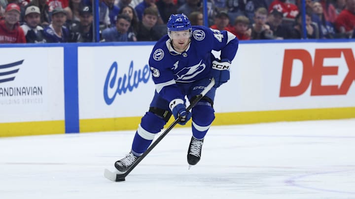 Mar 12, 2026; Tampa, Florida, USA; Tampa Bay Lightning defenseman Darren Raddysh (43) controls the puck against the Detroit Red Wings in the first period at Benchmark International Arena. Mandatory Credit: Nathan Ray Seebeck-Imagn Images