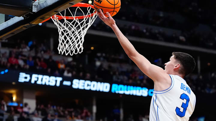 Mar 20, 2025; Denver, CO, USA; Brigham Young Cougars guard Egor Demin (3) shoots the ball against the VCU Rams during the first half in the first round of the NCAA Tournament at Ball Arena. Mandatory Credit: Ron Chenoy-Imagn Images