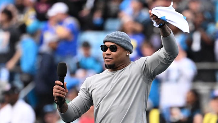 Former Carolina Panthers player Steve Smith talks to the crowd before an NFC Wild Card Round game at Bank of America Stadium.