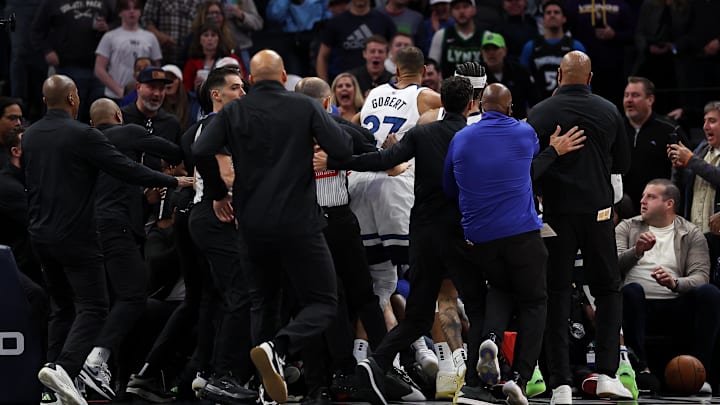 Mar 30, 2025; Minneapolis, Minnesota, USA; Minnesota Timberwolves and Detroit Pistons players get into a fight during the second quarter at Target Center. Mandatory Credit: Matt Krohn-Imagn Images