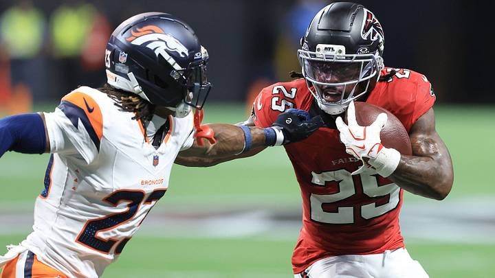 Jahdae Barron (23) of the Denver Broncos reaches for Tyler Goodson (25) of the Atlanta Falcons during the Friday evening NFL, American Football Herren, USA preseason football game between the Atlanta Falcons and the Denver Broncos on August 14, 2026 at Mercedes-Benz Stadium in Atlanta, Georgia. Jahdae Barron (23) of the Denver Broncos reaches for Tyler Goodson (25) of the Atlanta Falcons during the Friday evening NFL, American Football Herren, USA preseason football game between the Atlanta Falcons and the Denver Broncos on August 14, 2026 at Mercedes-Benz Stadium in Atlanta, Georgia.