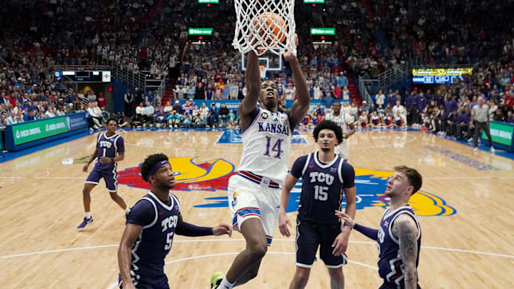 Jan 6, 2026; Lawrence, Kansas, USA; Kansas Jayhawks guard Melvin Council Jr. (14) shoots against the TCU Horned Frogs during the second half of the game at Allen Fieldhouse. Mandatory Credit: Denny Medley-Imagn Images