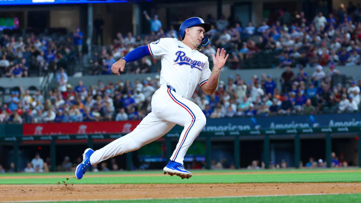 Apr 30, 2024; Arlington, Texas, USA; Texas Rangers left fielder Wyatt Langford (36) runs to third base during the second inning against the Washington Nationals at Globe Life Field. Mandatory Credit: Kevin Jairaj-USA TODAY Sports