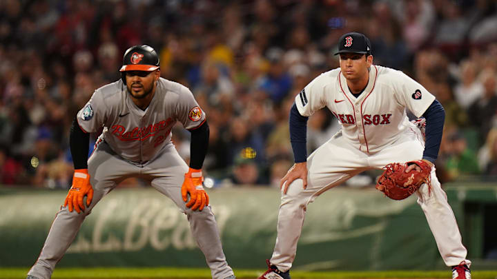 Sep 11, 2024; Boston, Massachusetts, USA; Baltimore Orioles designated hitter Anthony Santander (25) at first base with Boston Red Sox first baseman Triston Casas (36) in the first inning at Fenway Park. Mandatory Credit: David Butler II-Imagn Images