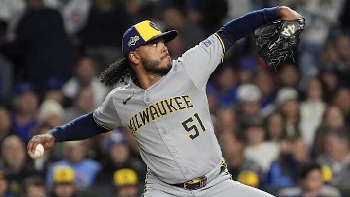 Oct 9, 2025; Chicago, Illinois, USA; Milwaukee Brewers pitcher Freddy Peralta (51) throws pitch against the Chicago Cubs during the first inning for game four of the NLDS round for the 2025 MLB playoffs at Wrigley Field. Mandatory Credit: David Banks-Imagn Images