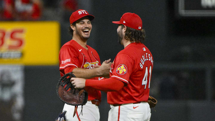 Sep 19, 2025; St. Louis, Missouri, USA;  St. Louis Cardinals third baseman Nolan Arenado (28) celebrates with first baseman Alec Burleson (41) after the Cardinals defeated the Milwaukee Brewers at Busch Stadium. Mandatory Credit: Jeff Curry-Imagn Images