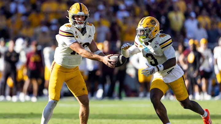Oct 18, 2025; Tempe, Arizona, USA; Arizona State Sun Devils quarterback Sam Leavitt (10) hands off the ball to running back Raleek Brown (3) against the Texas Tech Red Raiders at Mountain America Stadium. Mandatory Credit: Mark J. Rebilas-Imagn Images Oct 18, 2025; Tempe, Arizona, USA; Arizona State Sun Devils quarterback Sam Leavitt (10) hands off the ball to running back Raleek Brown (3) against the Texas Tech Red Raiders at Mountain America Stadium. Mandatory Credit: Mark J. Rebilas-Imagn Images