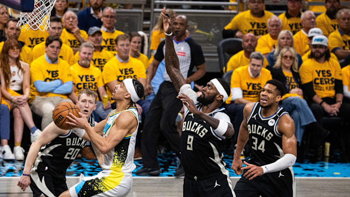 Apr 29, 2025; Indianapolis, Indiana, USA; Indiana Pacers guard Andrew Nembhard (2) shoots the ball while Milwaukee Bucks forward Bobby Portis (9) defends during game five of the first round for the 2024 NBA Playoffs at Gainbridge Fieldhouse. Mandatory Credit: Trevor Ruszkowski-Imagn Images Apr 29, 2025; Indianapolis, Indiana, USA; Indiana Pacers guard Andrew Nembhard (2) shoots the ball while Milwaukee Bucks forward Bobby Portis (9) defends during game five of the first round for the 2024 NBA Playoffs at Gainbridge Fieldhouse. Mandatory Credit: Trevor Ruszkowski-Imagn Images