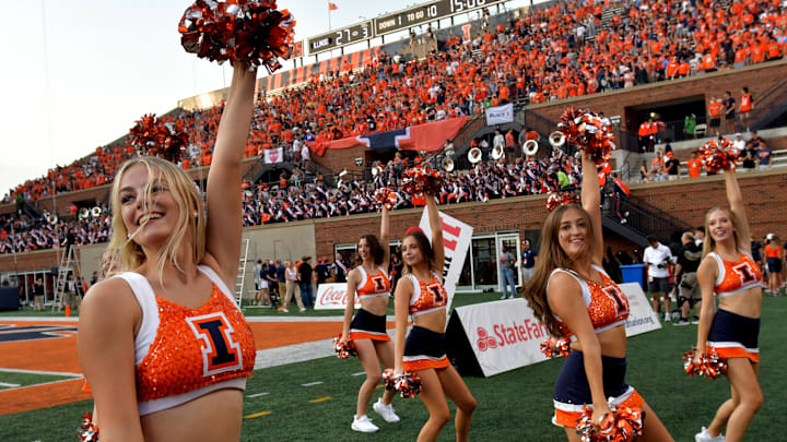 The Illinois Fighting Illini dance team performs in the second half against the Purdue Boilermakers at Memorial Stadium. 