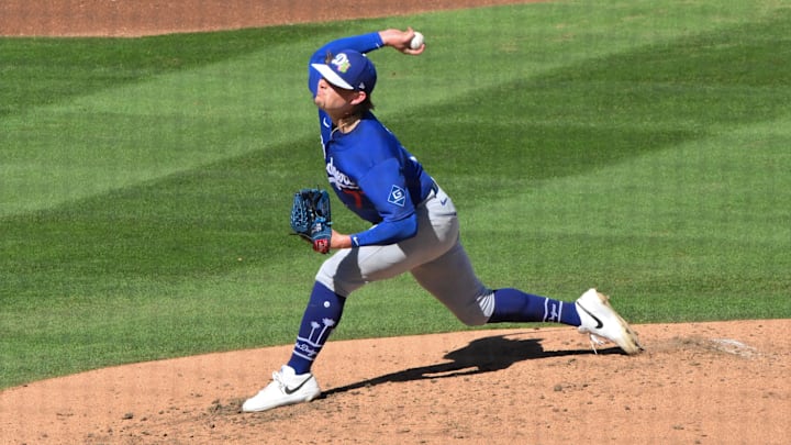 Feb 25, 2026; Salt River Pima-Maricopa, Arizona, USA; Los Angeles Dodgers pitcher River Ryan (77) throws in the third inning against the Arizona Diamondbacks at Salt River Fields at Talking Stick. Mandatory Credit: Matt Kartozian-Imagn Images Feb 25, 2026; Salt River Pima-Maricopa, Arizona, USA; Los Angeles Dodgers pitcher River Ryan (77) throws in the third inning against the Arizona Diamondbacks at Salt River Fields at Talking Stick. Mandatory Credit: Matt Kartozian-Imagn Images