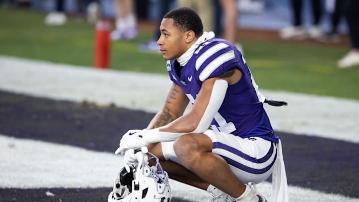 Dec 26, 2024; Phoenix, AZ, USA; Kansas State Wildcats safety Marques Sigle (21) against the Rutgers Scarlet Knights during the Rate Bowl at Chase Field. Mandatory Credit: Mark J. Rebilas-Imagn Images