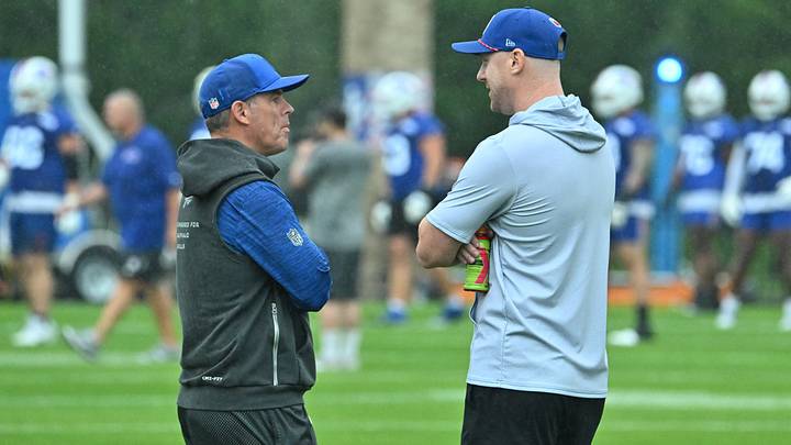 Buffalo Bills head coach Joe Brady (right) speaks with general manager Brandon Beane during training camp at St. John Fisher University.