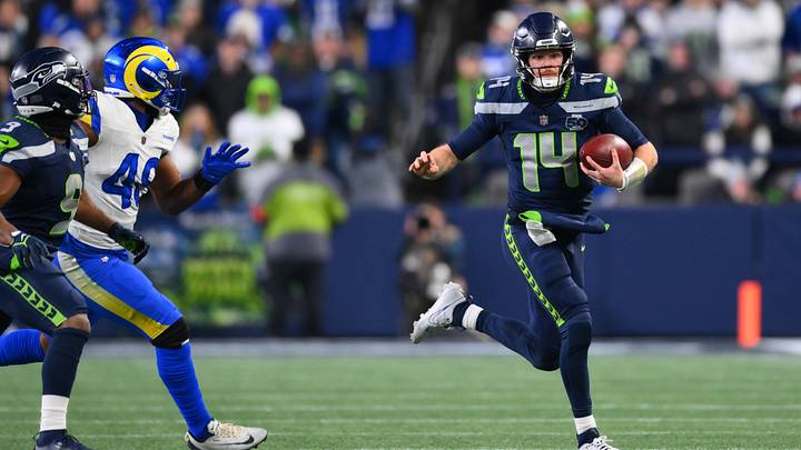 Jan 25, 2026; Seattle, WA, USA; Seattle Seahawks quarterback Sam Darnold (14) runs against the Los Angeles Rams during the second half in the 2026 NFC Championship Game at Lumen Field. Mandatory Credit: Steven Bisig-Imagn Images Jan 25, 2026; Seattle, WA, USA; Seattle Seahawks quarterback Sam Darnold (14) runs against the Los Angeles Rams during the second half in the 2026 NFC Championship Game at Lumen Field. Mandatory Credit: Steven Bisig-Imagn Images