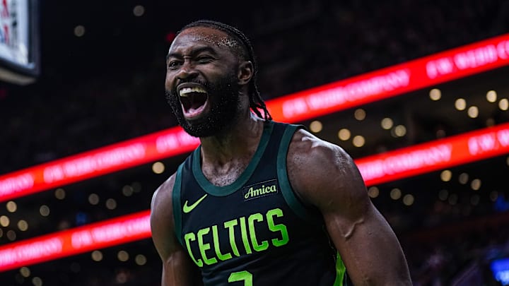 Boston Celtics guard Jaylen Brown reacts after a basket. The defending champs are humming in the early going. Boston Celtics guard Jaylen Brown reacts after a basket. The defending champs are humming in the early going.
