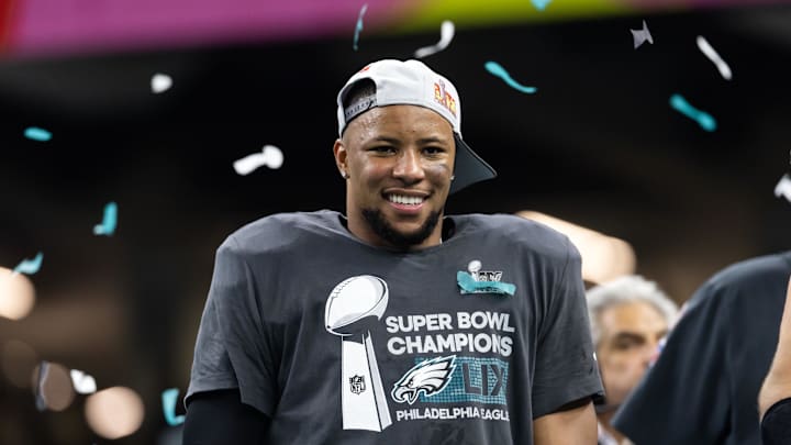 Feb 9, 2025; New Orleans, LA, USA; Philadelphia Eagles running back Saquon Barkley (26) celebrates after defeating the Kansas City Chiefs during Super Bowl LIX at Ceasars Superdome. Mandatory Credit: Mark J. Rebilas-Imagn Images