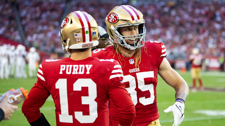 Dec 17, 2023; Glendale, Arizona, USA; San Francisco 49ers tight end George Kittle (85) with quarterback Brock Purdy (13) against the Arizona Cardinals at State Farm Stadium. Mandatory Credit: Mark J. Rebilas-USA TODAY Sports
