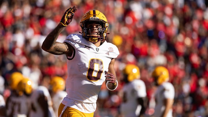 Nov 30, 2024; Tucson, Arizona, USA; Arizona State Sun Devils wide receiver Jordyn Tyson (0) celebrates a touchdown against the Arizona Wildcats in the first half during the Territorial Cup at Arizona Stadium. Mandatory Credit: Mark J. Rebilas-Imagn Images
