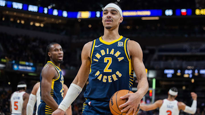 Feb 11, 2025; Indianapolis, Indiana, USA; Indiana Pacers guard Andrew Nembhard (2) holds the ball in the second half against the New York Knicks at Gainbridge Fieldhouse. Mandatory Credit: Trevor Ruszkowski-Imagn Images