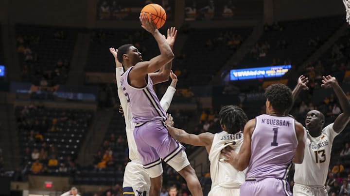 Jan 9, 2024; Morgantown, West Virginia, USA; Kansas State Wildcats guard Cam Carter (5) shoots a jump shot against West Virginia.