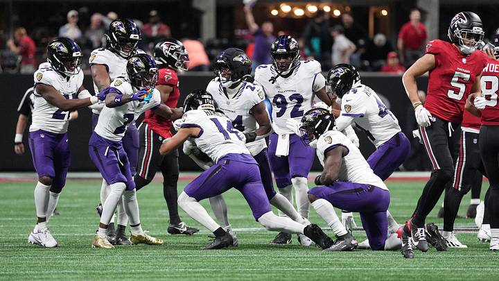 Oct 11, 2026; Atlanta, Georgia, USA; Baltimore Ravens safety Kyle Hamilton (14) celebrates with teammates after making an interception to end the game in overtime against the Atlanta Falcons at Mercedes-Benz Stadium. Mandatory Credit: Dale Zanine-Imagn Images Oct 11, 2026; Atlanta, Georgia, USA; Baltimore Ravens safety Kyle Hamilton (14) celebrates with teammates after making an interception to end the game in overtime against the Atlanta Falcons at Mercedes-Benz Stadium. Mandatory Credit: Dale Zanine-Imagn Images