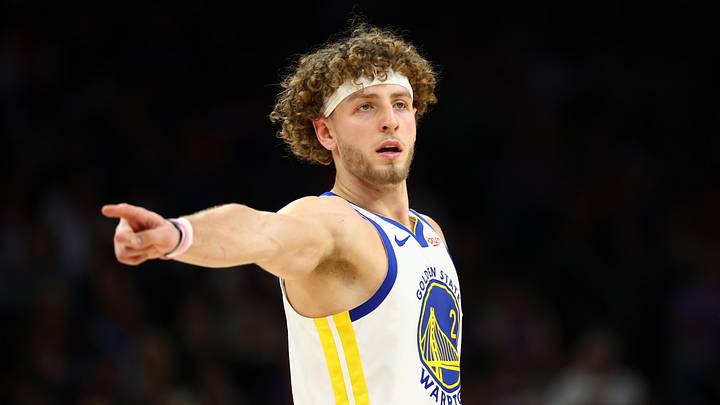 Dec 18, 2025; Phoenix, Arizona, USA; Golden State Warriors guard Brandin Podziemski (2) reacts against the Phoenix Suns in the second half at Mortgage Matchup Center. Mandatory Credit: Mark J. Rebilas-Imagn Images Dec 18, 2025; Phoenix, Arizona, USA; Golden State Warriors guard Brandin Podziemski (2) reacts against the Phoenix Suns in the second half at Mortgage Matchup Center. Mandatory Credit: Mark J. Rebilas-Imagn Images